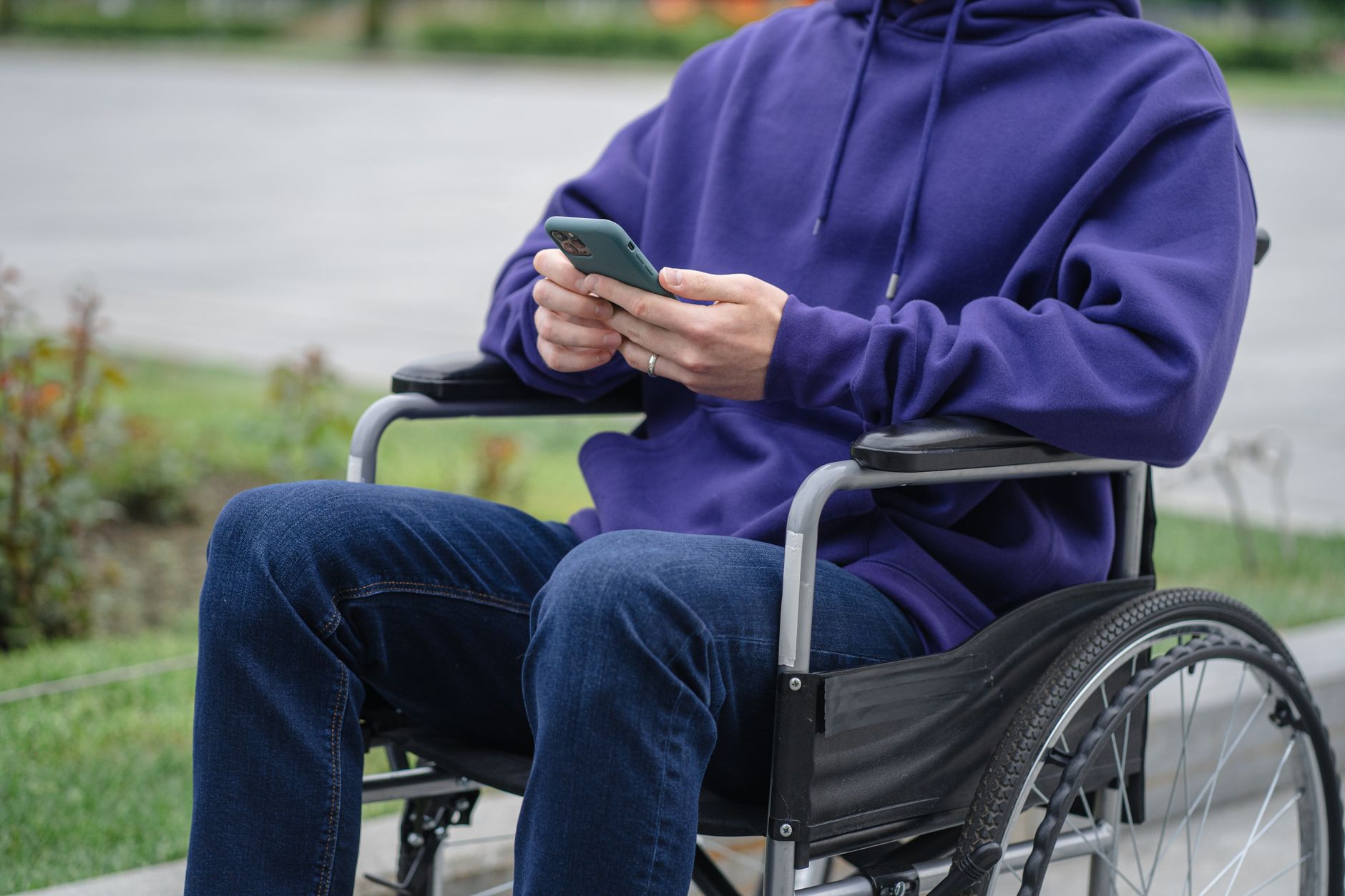 modern wheelchair technology person outdoors park mobility — stock photo