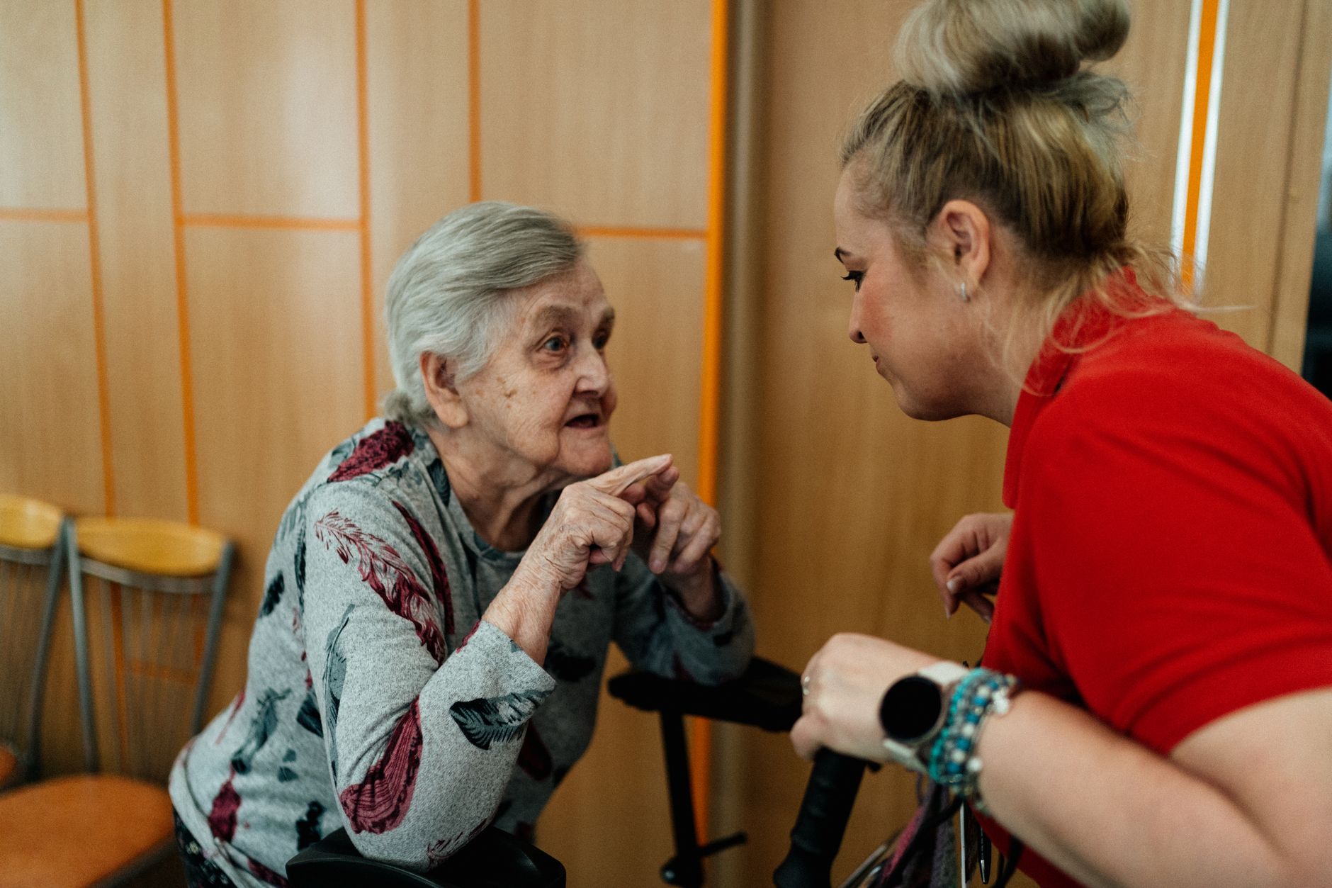 caregiver helping elderly home visit support worker — stock photo